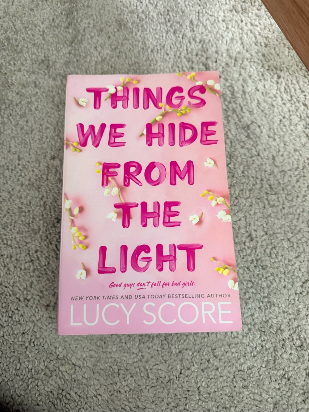 Things We Hide From The Light by Lucy Score - Pink Cover